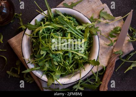 Fresh arugola leaves, delicious and healthy salad ingredient Stock Photo