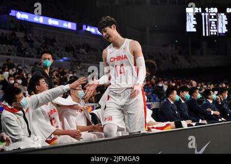 Melbourne, Australia. 4th July, 2022. Wang Zhelin (top) of China claps hands with teammates during a Group B match between China and Chinese Taipei of the FIBA World Cup Asian qualifiers in Melbourne, Australia, July 4, 2022. Credit: Bai Xue/Xinhua/Alamy Live News Stock Photo