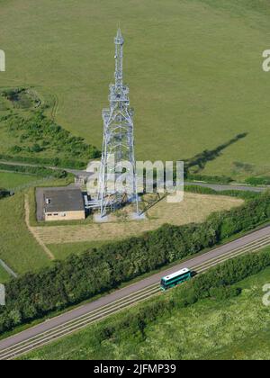 AERIAL VIEW. Double-decker bus on a guided busway in the countryside north of Cambridge. Over, Cambridgeshire, England, United Kindgom. Stock Photo