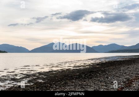 Sunset on the beach on Loch Linnhe, Ballachulish, near Fort William and Glencoe in the West Highlands of Scotland. Stock Photo