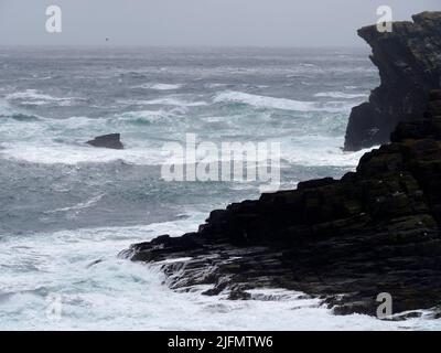 Waves breaking on Burroo, calf of Man, Isle of Man Stock Photo