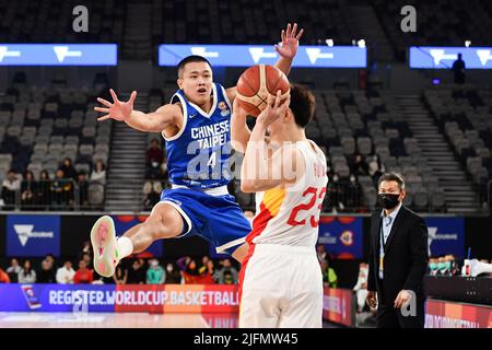 Melbourne, Australia. 4th July, 2022. Chen Yu Wei (L) of Chinese Taipei blocks Hu Mingxuan of China during a Group B match between China and Chinese Taipei of the FIBA World Cup Asian qualifiers, in Melbourne, Australia, July 4, 2022. Credit: Bai Xue/Xinhua/Alamy Live News Stock Photo
