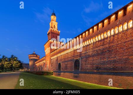 Sforzesco Castle and fountain in Milan, Italy at twilight. Stock Photo