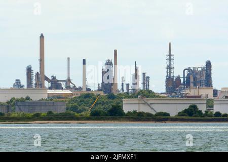 Fawley, Hampshire, UK.  4th July 2022.  General view of the Fawley Oil Refinery which sits on the banks of Southampton Water near Southampton in Hampshire which is owned by the ESSO Petroleum Company.  Picture Credit: Graham Hunt/Alamy Live News Stock Photo