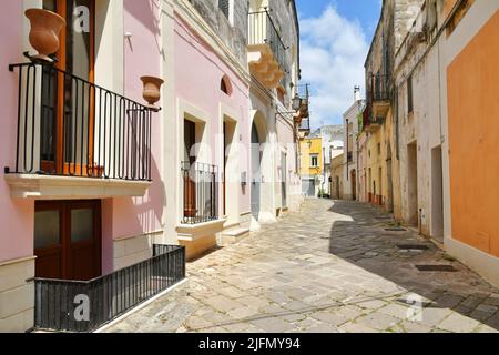 A street in the historic center of Tricase, a medieval town in the Puglia region, Italy. Stock Photo