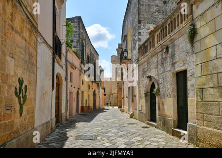 A street in the historic center of Tricase, a medieval town in the Puglia region, Italy. Stock Photo