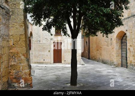 A street in the historic center of Tricase, a medieval town in the Puglia region, Italy. Stock Photo