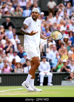 Nick Kyrgios reacts during his Gentlemen's singles fourth round match against Brandon Nakashima on centre court on day eight of the 2022 Wimbledon Championships at the All England Lawn Tennis and Croquet Club, Wimbledon. Picture date: Monday July 4, 2022. Stock Photo