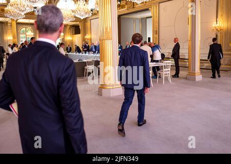 Paris, France, July 04, 2022, French President Emmanuel Macron arrives for the first cabinet meeting of the newly reshuffled government at the Elysee Palace in Paris, France, on July 04, 2022. Photo by Romain Gaillard/Pool/ABACAPRESS.COM Stock Photo