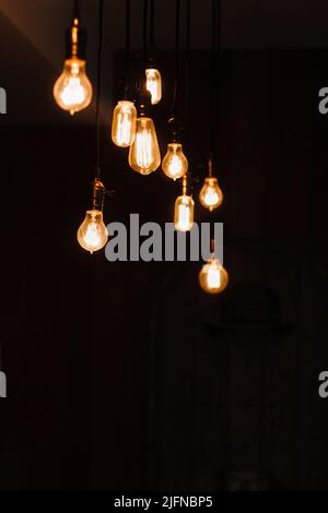 Incandescent lamps in a modern loft. Edison lamp. Stock Photo