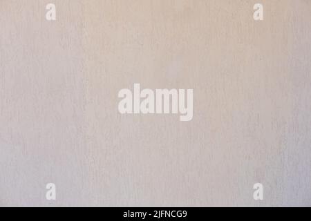 Textured wall lined with shell rock tiles. Stock Photo