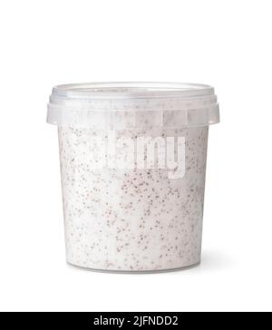 Front view of body scrub in transparent plastic container isolated on white