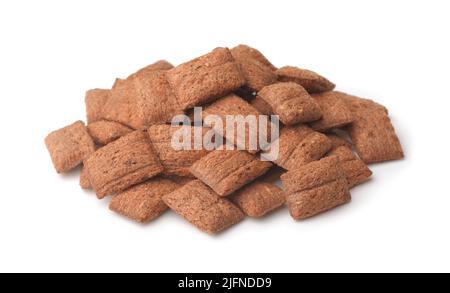 Heap of chocolate cereal pillows isolated on white Stock Photo