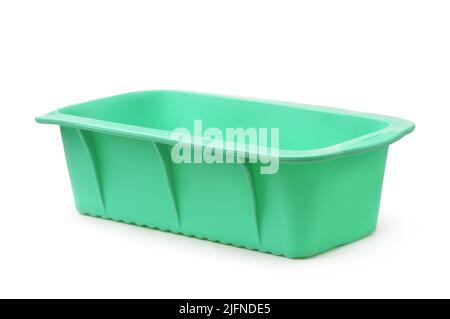 Green empty silicone baking mould isolated on white Stock Photo