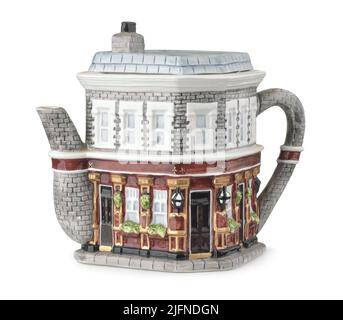 Old decorative ceramic english cottage teapot isolated on white Stock Photo