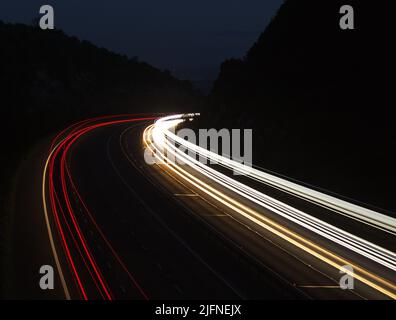 highway at night tail lights headlights Stock Photo