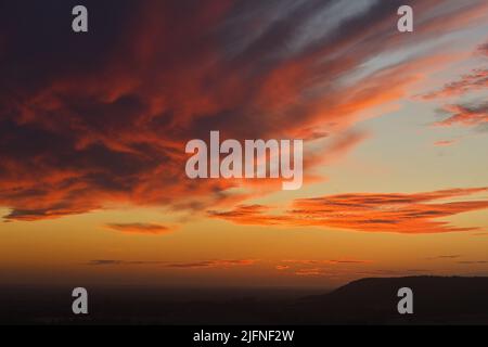 deep red fire in the clouds sunrise Stock Photo