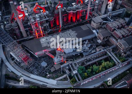Aerial view of the Voelklingen Ironworks Unesco World Heritage Site red  with the night red lighting Stock Photo