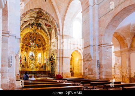 Nave of the church, in the background the Hight Altar and baroque altarpiece. Monastery of Santa María de Huerta is a Cistercian monastery located in Stock Photo
