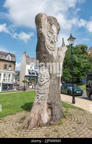 A tree carved 'Montpellier Quarter' engraved for the Tour de France visit in 2014, Harrogate, North Yorkshire Harrogate, North Yorkshire, UK. Stock Photo