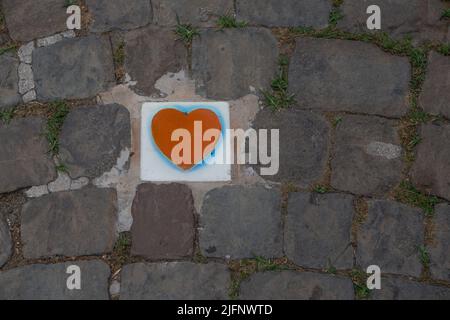Heart encased in the stone pavement Stock Photo
