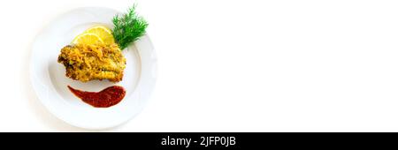 Battered fish on a white ceramic plate with lemon, red sauce and herbs on an isolated white background. Ingredients: cod, batter, dill. Copy space . Stock Photo