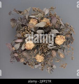 bouquet of dried flowers on a neutral background, top view Stock Photo