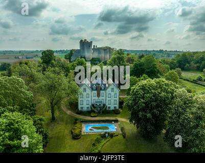 Aerial top down ground plan view of Montaigu le blin Gothic ruin castle in Allier department in Central France. Lower courtyard surrounded by ruined w Stock Photo