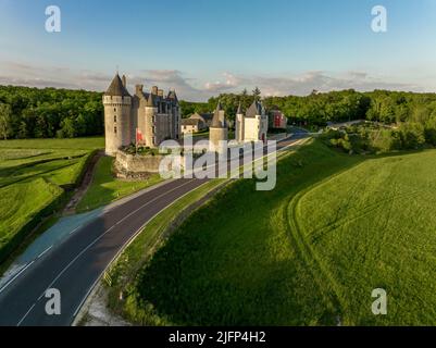 Aerial view of Montpoupon castle, French Renaissance chateau in the Loire Valley with round towers , gate house in a forested valley Stock Photo