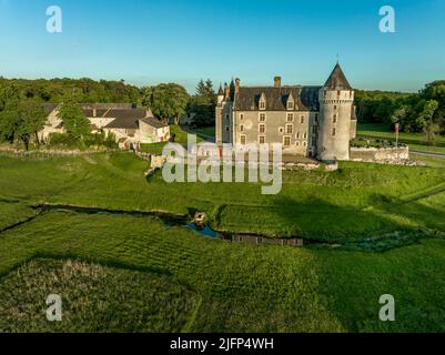 Aerial view of Montpoupon castle, French Renaissance chateau in the Loire Valley with round towers , gate house in a forested valley Stock Photo