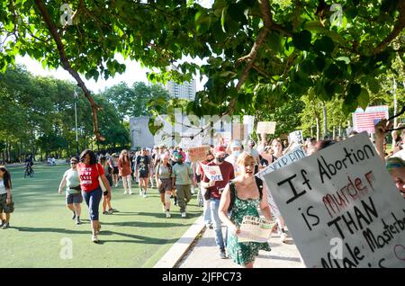 Various activist groups gathered at Cadman Plaza and marched over Brooklyn Bridge in New York City to demand justice for abortion, environment, black Stock Photo