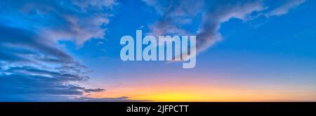 A Detailed Image Of White Fluffy Clouds Set Against A Blue Daytime Sky In Banner Image Format Stock Photo