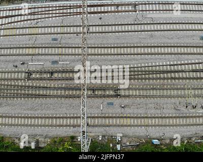 Colchester, UK. 04th July, 2022. (EDITORS NOTE: Image taken with drone) Colchester train station tracks leading out of the city. (Photo by Edward Crawford/SOPA Images/Sipa USA) Credit: Sipa USA/Alamy Live News Stock Photo