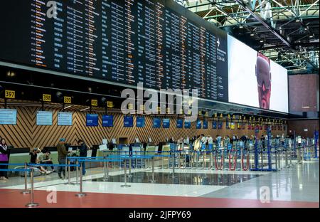 MOSCOW, RUSSIA - JULY 08, 2022: Sheremetyevo airport. flight information monitors and check-in in Sheremetyevo. airport check-in area Stock Photo