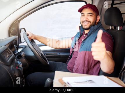 Always on time. Cropped portrait of a handsome young male courier out making deliveries. Stock Photo