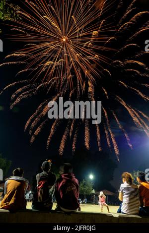 Los Angeles, California, USA. 4th July, 2022. Spectators gather near Rosemead Park to watch fireworks during the Fourth of July fireworks display in Rosemead, Calif. Monday, July 4, 2022. (Credit Image: © Ringo Chiu/ZUMA Press Wire) Stock Photo