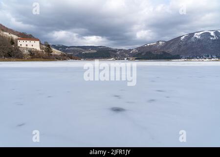 Frozen surface of Laceno Lake during winter, Campania, Italy Stock Photo