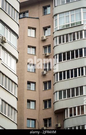 Many Windows on the facade of the house Stock Photo