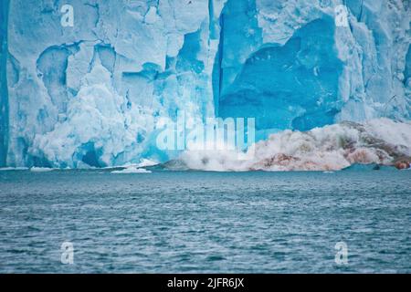 Ice Calving, Deep Blue Glacier, Signehamna Harbor, Nordvest-Spitsbergen National Park, Krossfjord, Arctic, Spitsbergen, Svalbard, Norway, Europe Stock Photo