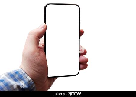 Mans hand in shirt holding a new cellphone with a white screen for mockup data. Digital templates and advertisement Stock Photo