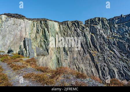 Cliffs formed from slate quarrying in the disused Dinorwic Slate Quarry near Llanberis North Wales UK March 2017 Stock Photo