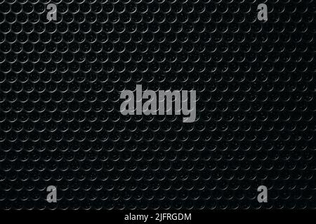 Safety net on the music speaker. Protective grid audio speakers. Close view of Black safety net. Metal perforated mesh, abstract pattern, Abstract bla Stock Photo