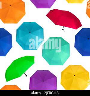 Seamless pattern of different colors colorful umbrellas isolated on white background Stock Photo