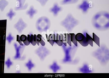 Cannes , paca  France - 06 15 2022 : Louis Vuitton logo brand store and sign violet facade text shop Luxury handbags and luggages Stock Photo