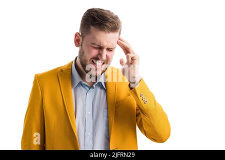 Exhausted man suffering from migraine Stock Photo