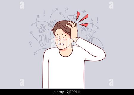 Unhealthy man suffer from headache or migraine. Unwell guy struggle ...