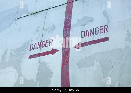 Danger warning sign decal on an old aircraft Stock Photo