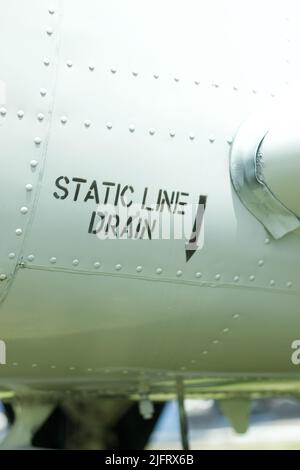 Static line drain decal on an old aircraft Stock Photo
