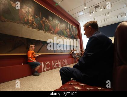 Protesting Last Supper Protesters from Just Stop Oil climate protest group glue their hands to ...