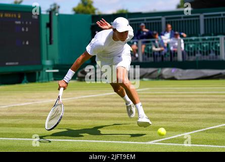 Gabriel Debru in action during his Boys' Singles second round match against Aidan Kim on court 12 on day nine of the 2022 Wimbledon Championships at the All England Lawn Tennis and Croquet Club, Wimbledon. Picture date: Tuesday July 5, 2022. Stock Photo